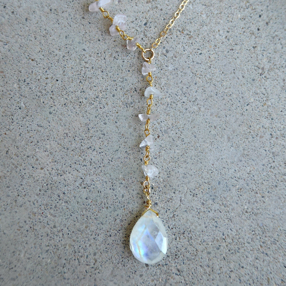 moonstone lariat necklace on grey background