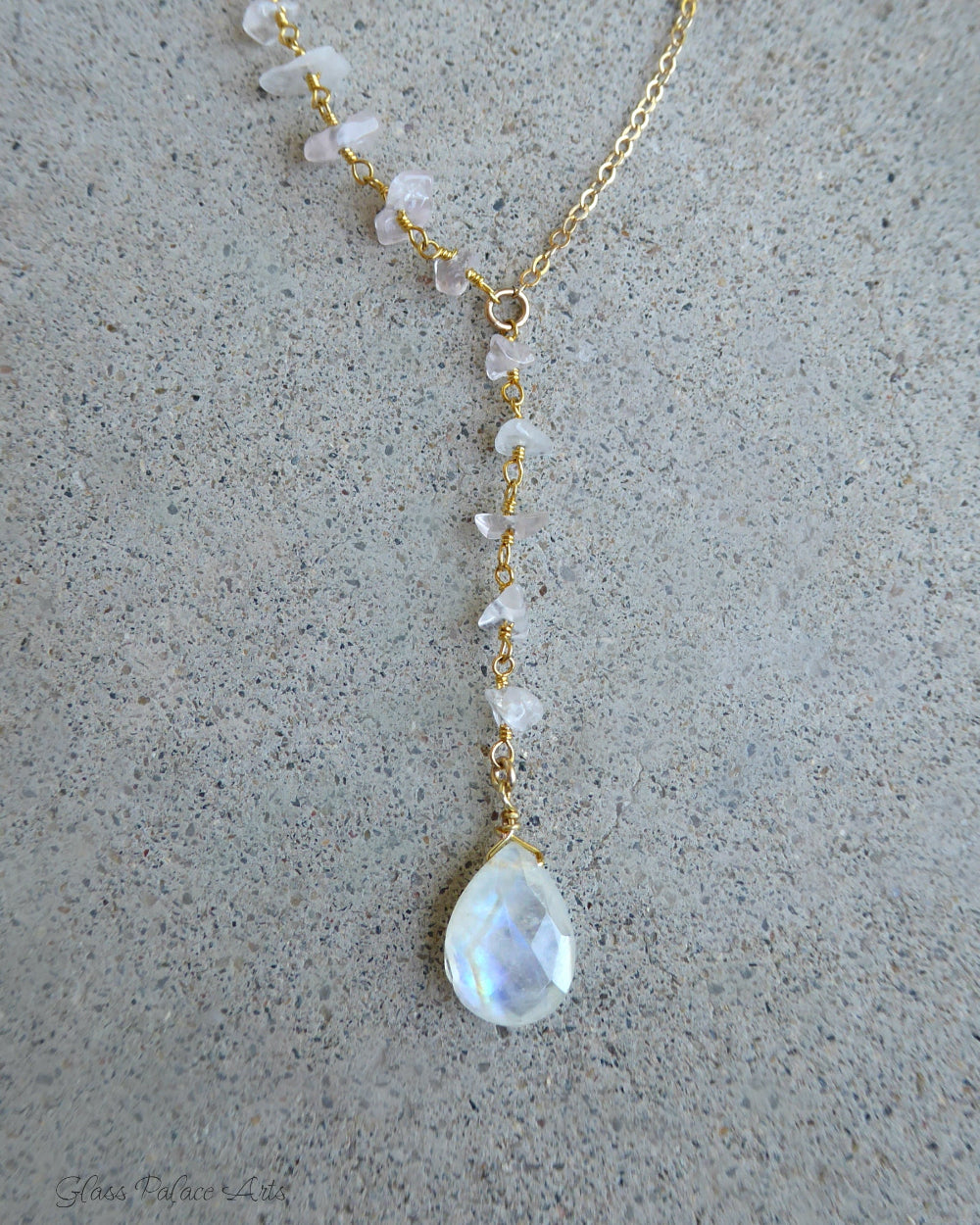 moonstone lariat necklace on grey background