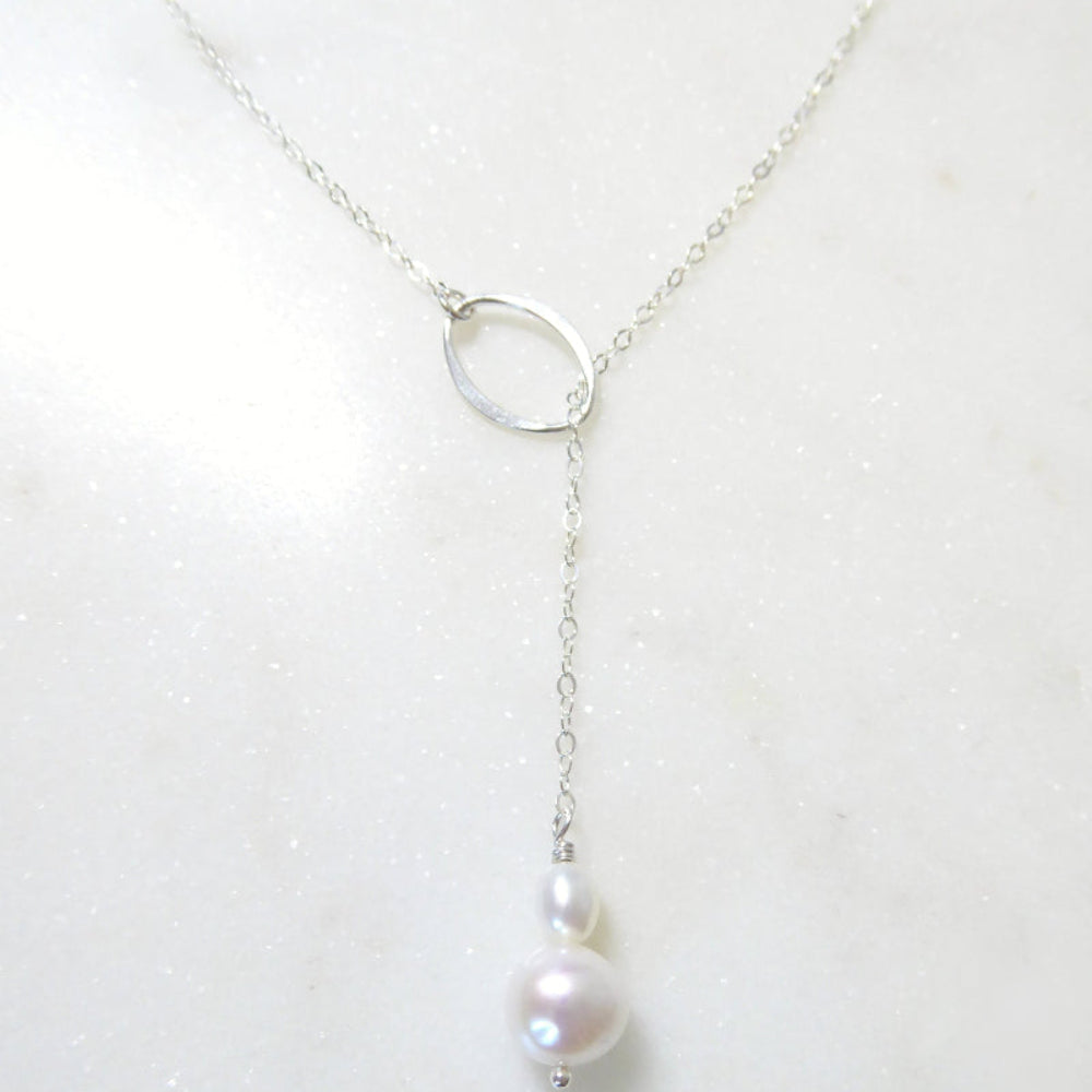 Pearl necklace on a white background