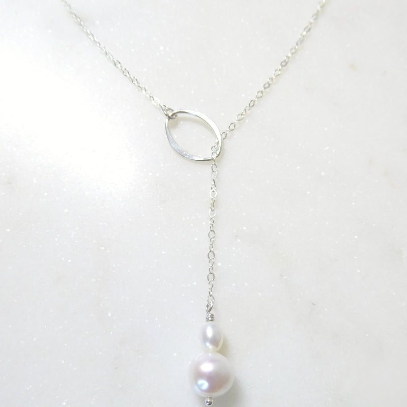 Pearl necklace on a white background