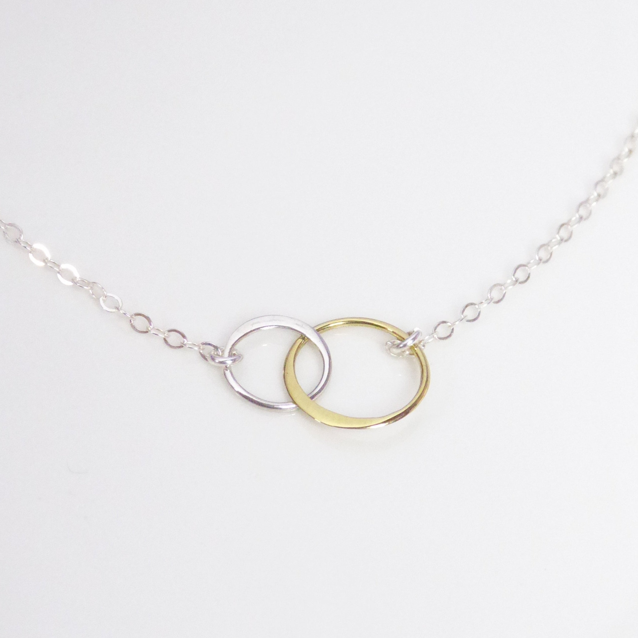 Mixed Metal Infinity Necklace With Interlocking Circles