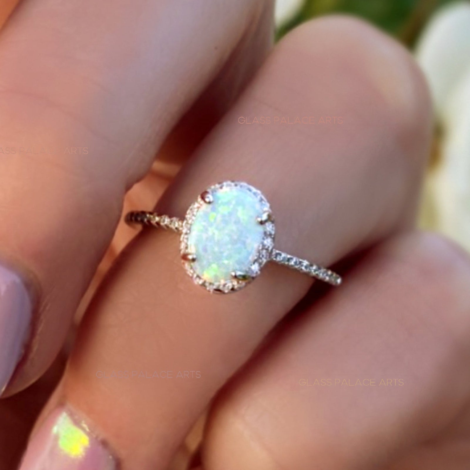 Sterling Silver White Opal Ring Encrusted with Cubic Zirconia