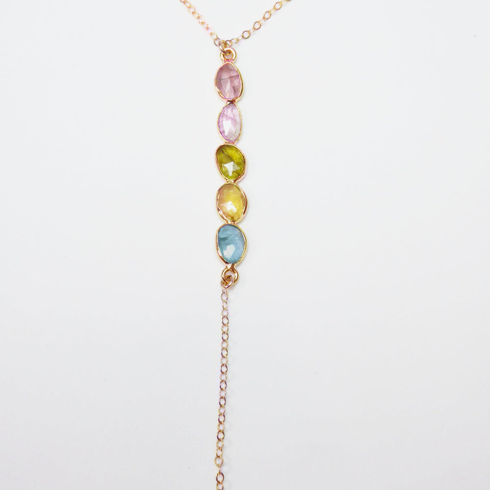 Tourmaline Necklace with multicolored gemstones on a white background