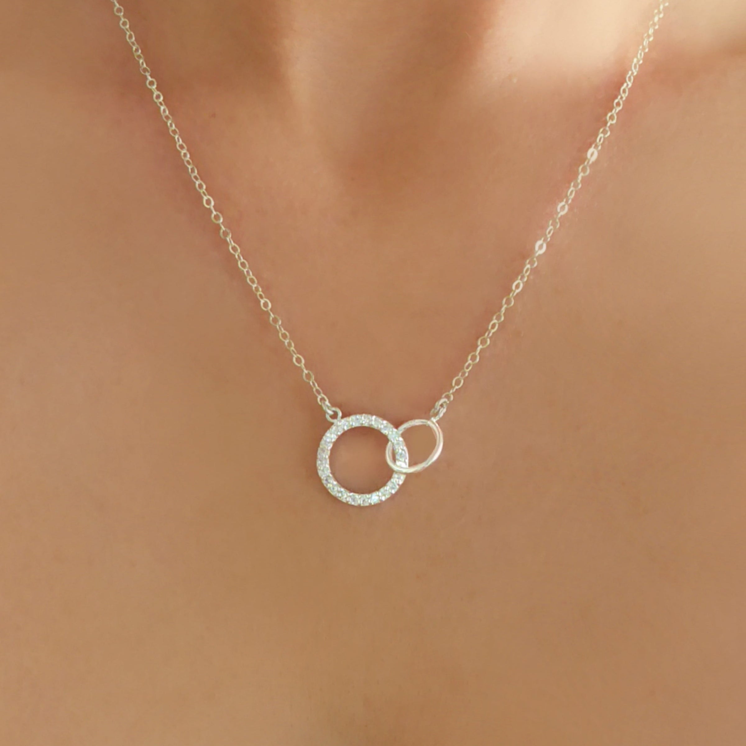 Sterling Silver Cubic Zirconia Infinity Necklace With Interlocking Circles and Pave' Stones