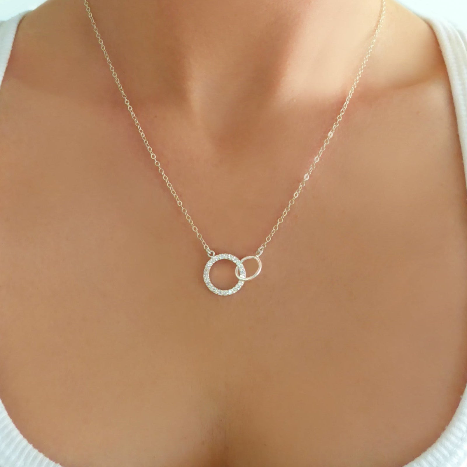 Sterling Silver Cubic Zirconia Infinity Necklace With Interlocking Circles and Pave' Stones