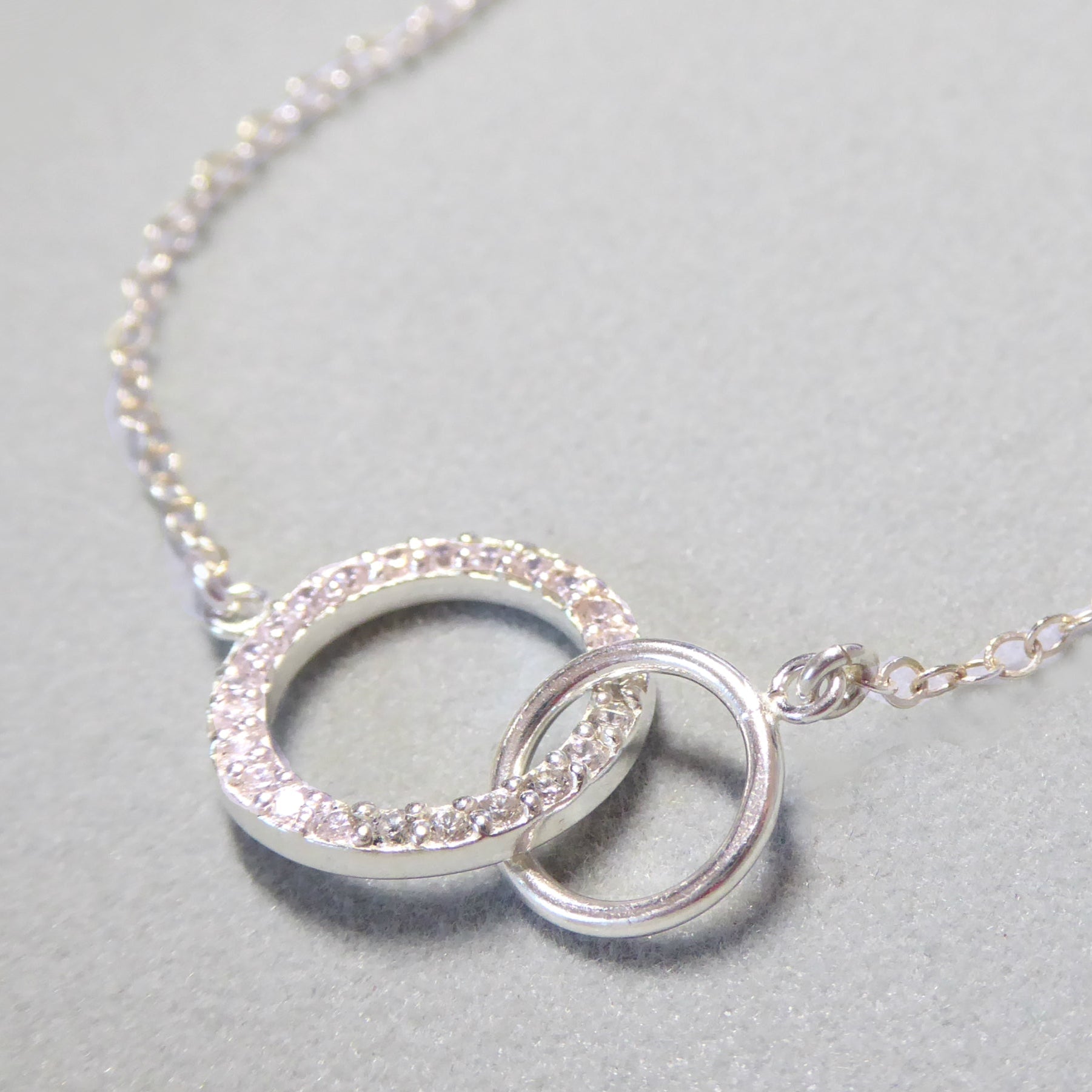 Sterling Silver Cubic Zirconia Infinity Necklace With Interlocking Circles and Pave' Stones