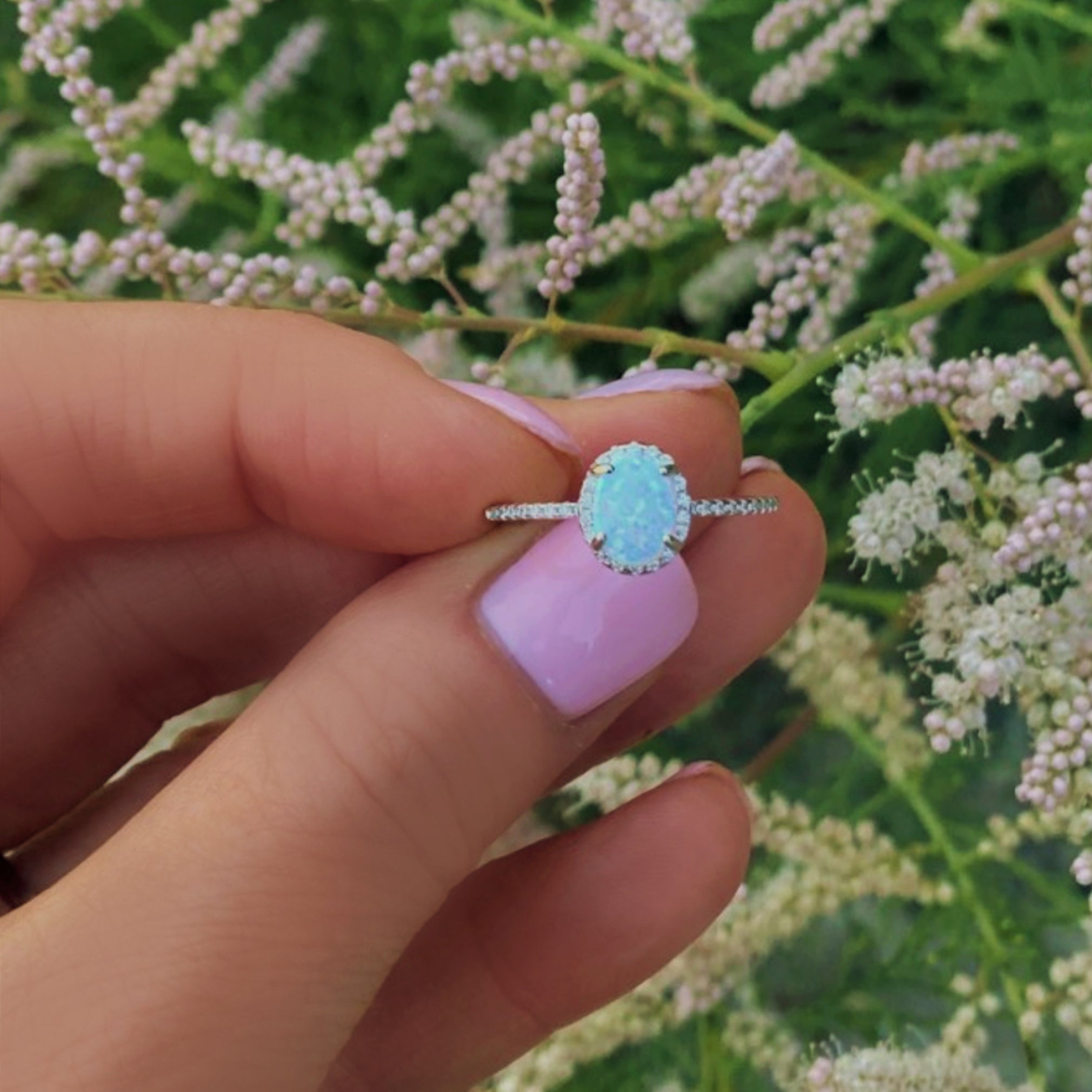 Sterling Silver White Opal Ring Encrusted with Cubic Zirconia