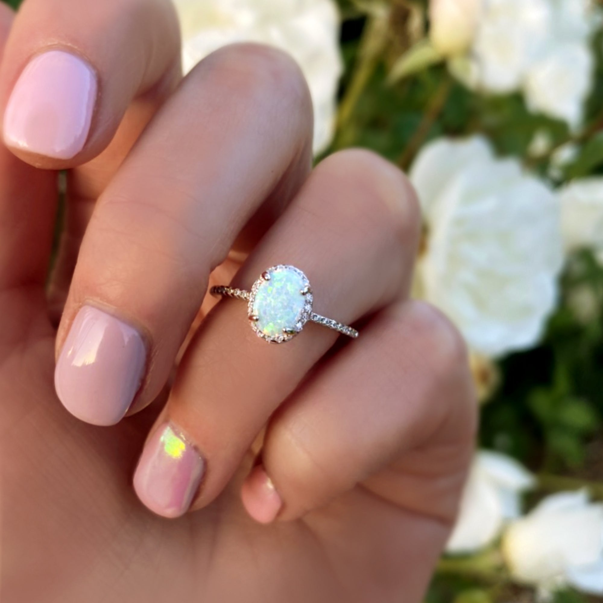 Sterling Silver White Opal Ring Encrusted with Cubic Zirconia