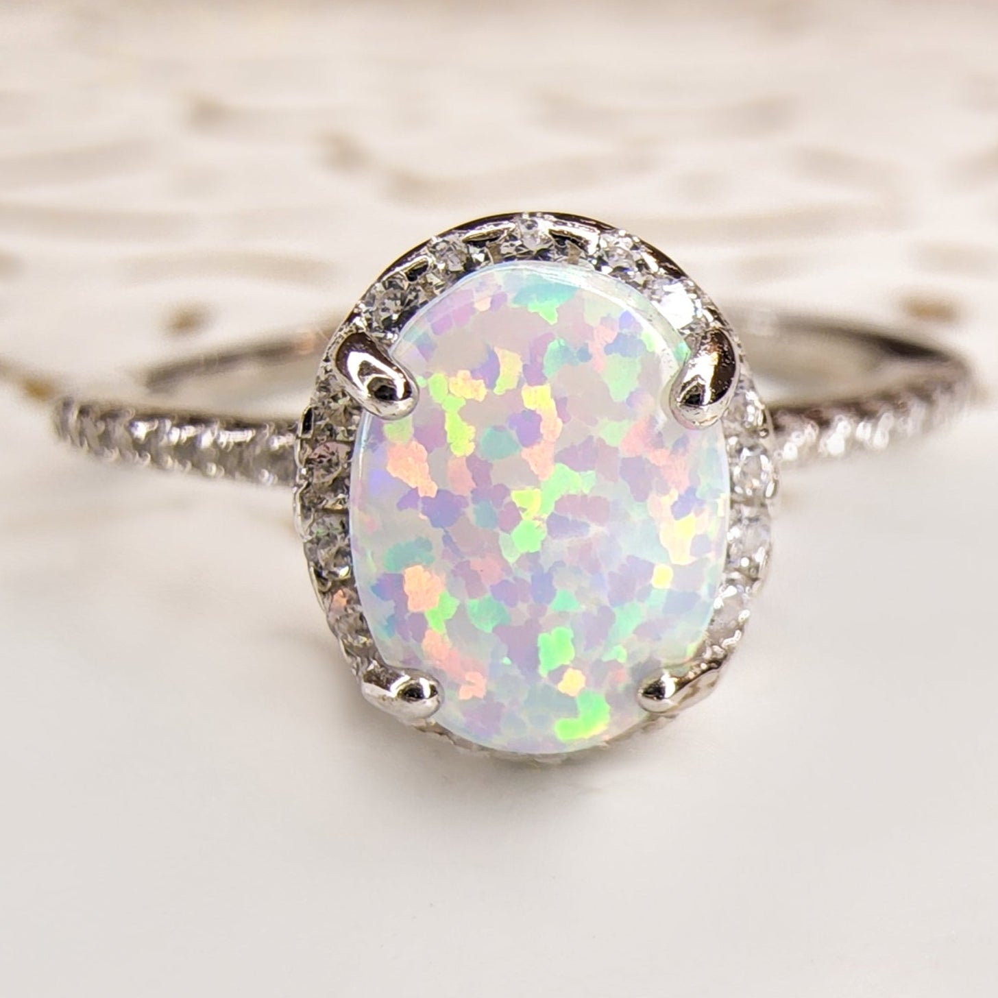 Sterling Silver White Opal Ring Encrusted with Cubic Zirconia