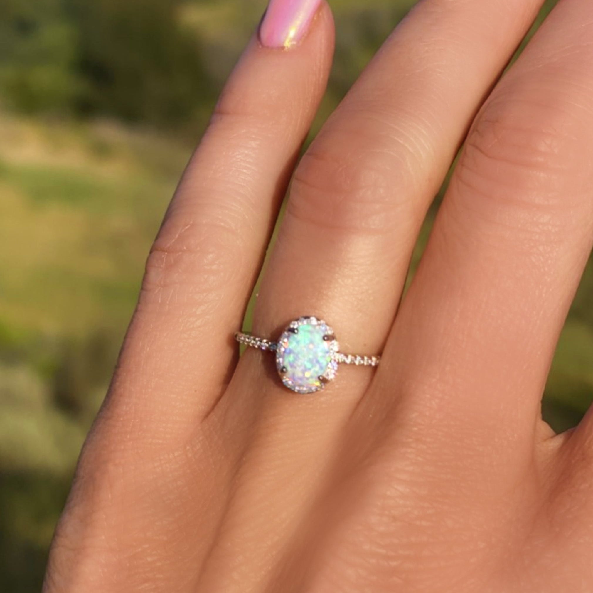 Sterling Silver White Opal Ring Encrusted with Cubic Zirconia