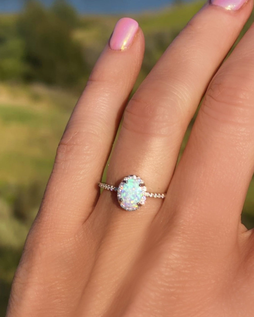Sterling Silver White Opal Ring Encrusted with Cubic Zirconia