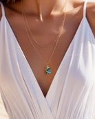 abalone layered multi strand pendant necklace on woman
