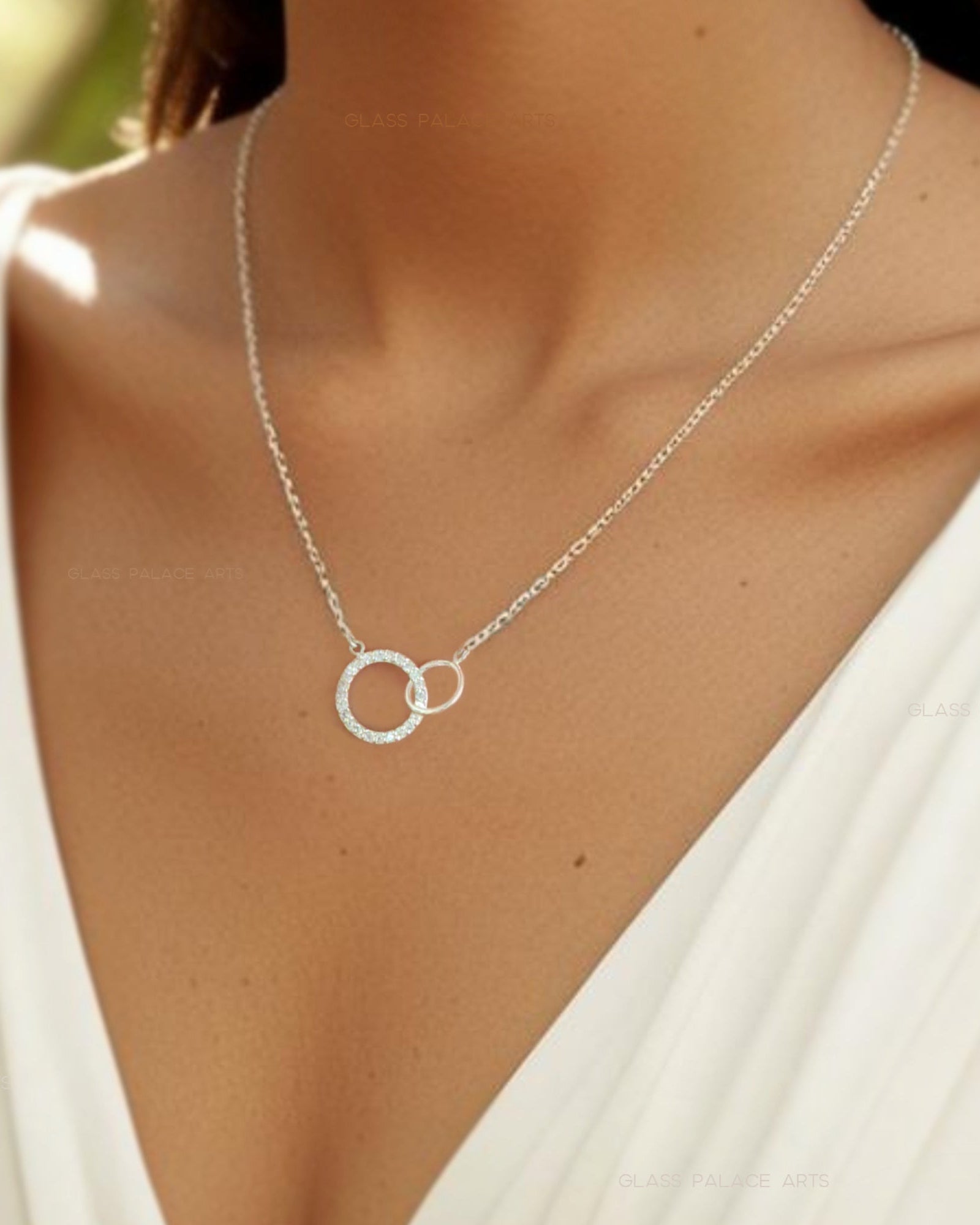 Sterling Silver Cubic Zirconia Infinity Necklace With Interlocking Circles and Pave' Stones