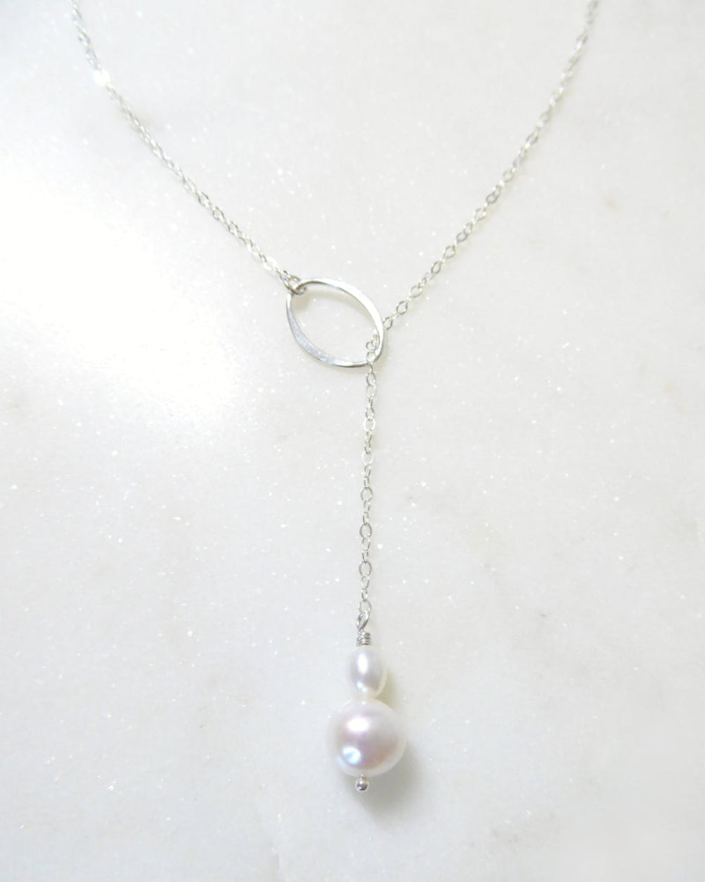 Pearl necklace on a white background