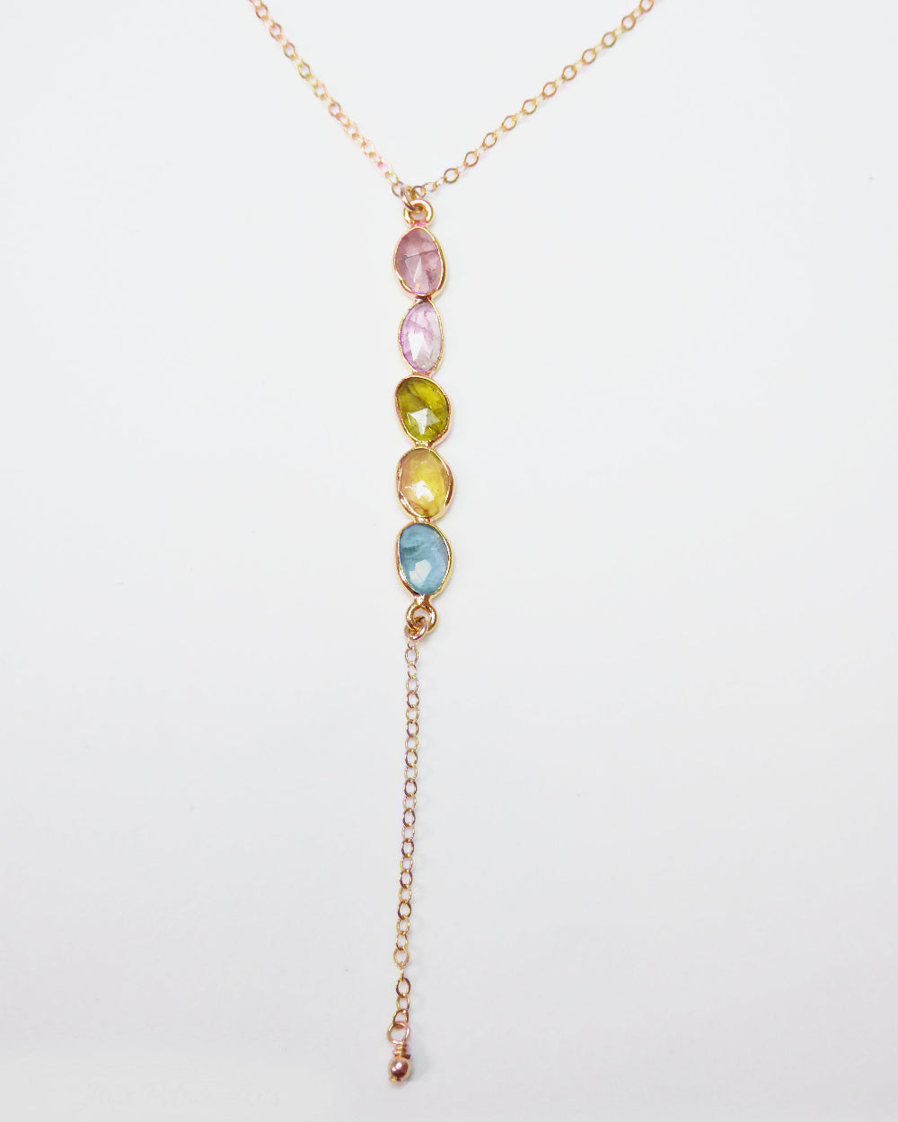 Tourmaline Necklace with multicolored gemstones on a white background