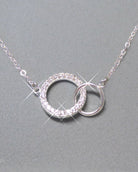 Sterling Silver Cubic Zirconia Infinity Necklace With Interlocking Circles and Pave' Stones