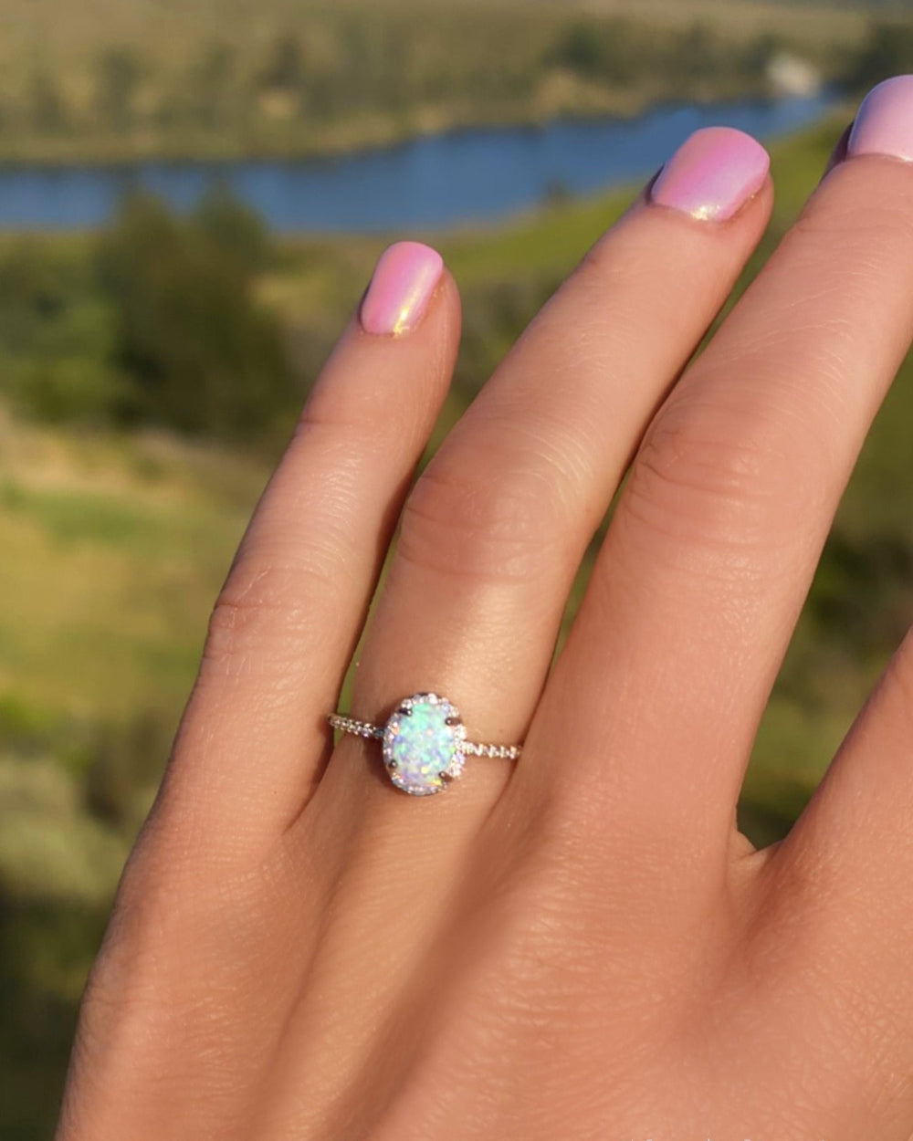 Sterling Silver White Opal Ring Encrusted with Cubic Zirconia