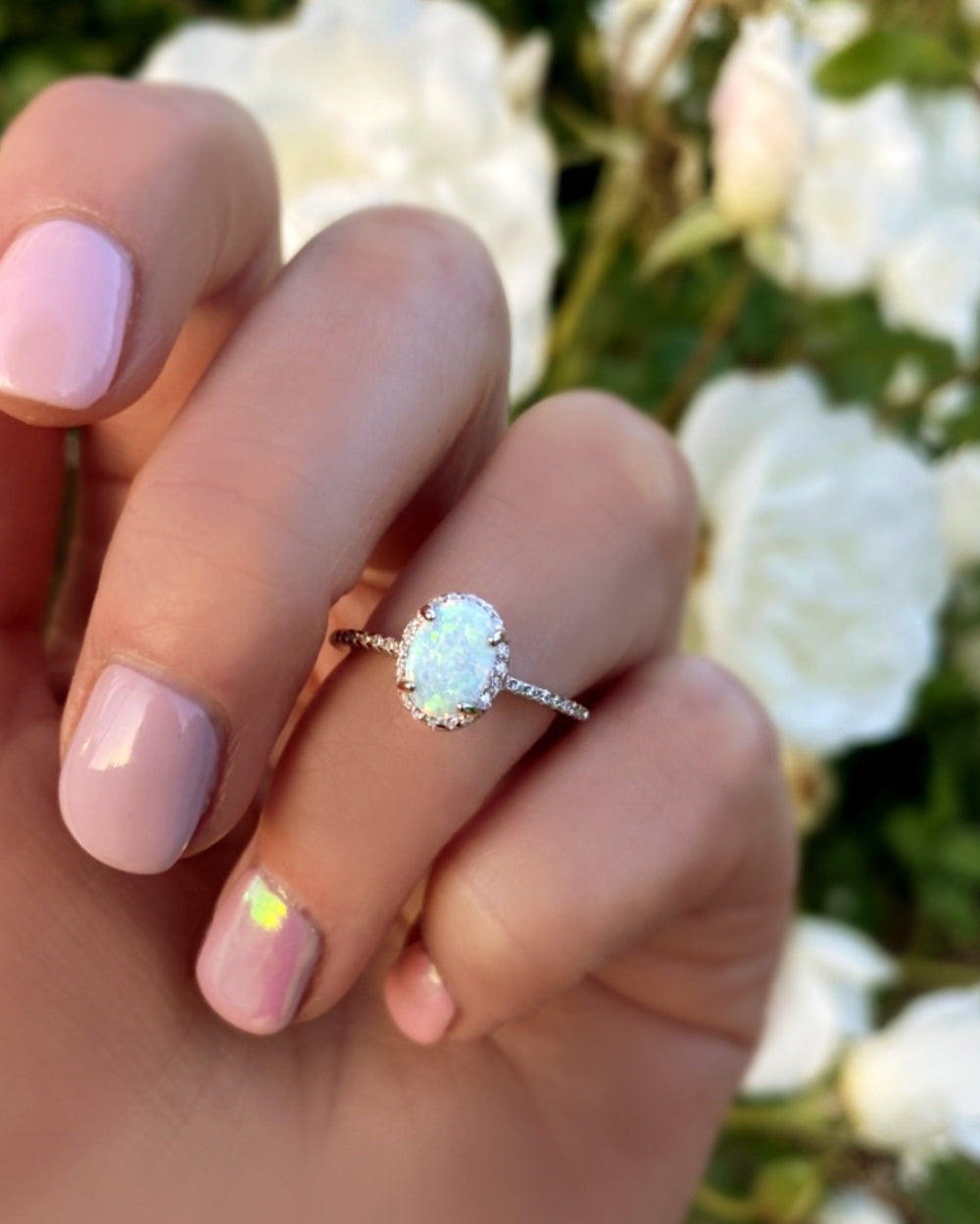 Sterling Silver White Opal Ring Encrusted with Cubic Zirconia