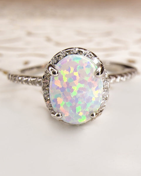 Sterling Silver White Opal Ring Encrusted with Cubic Zirconia